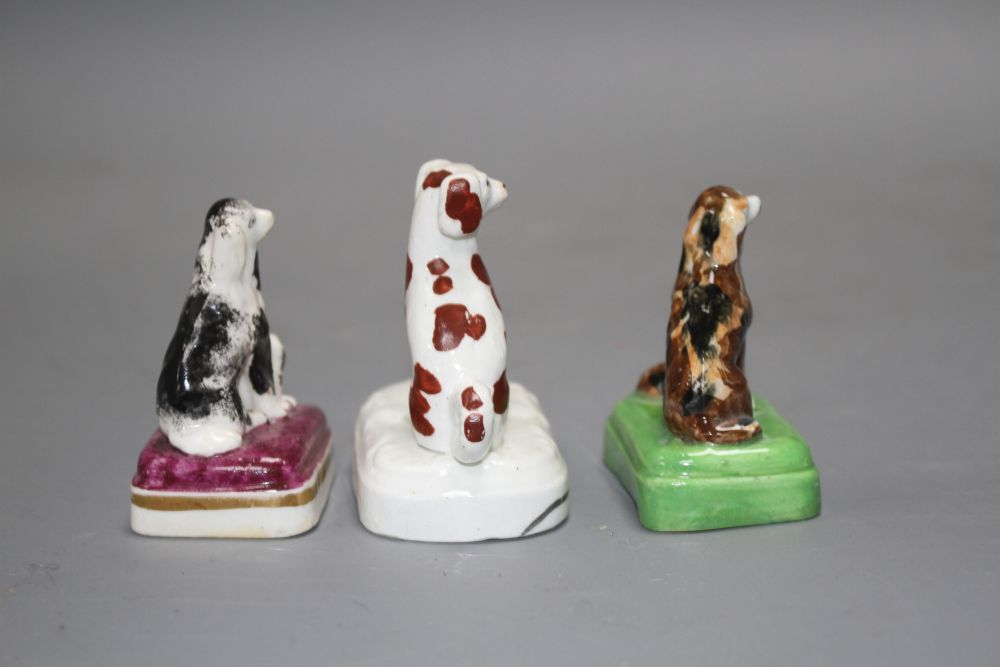Three small Staffordshire porcelain groups of a King Charles Spaniel and puppy, c.1835-50, H. 6.2 - 6.9cm